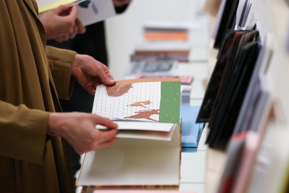 Person looking at books